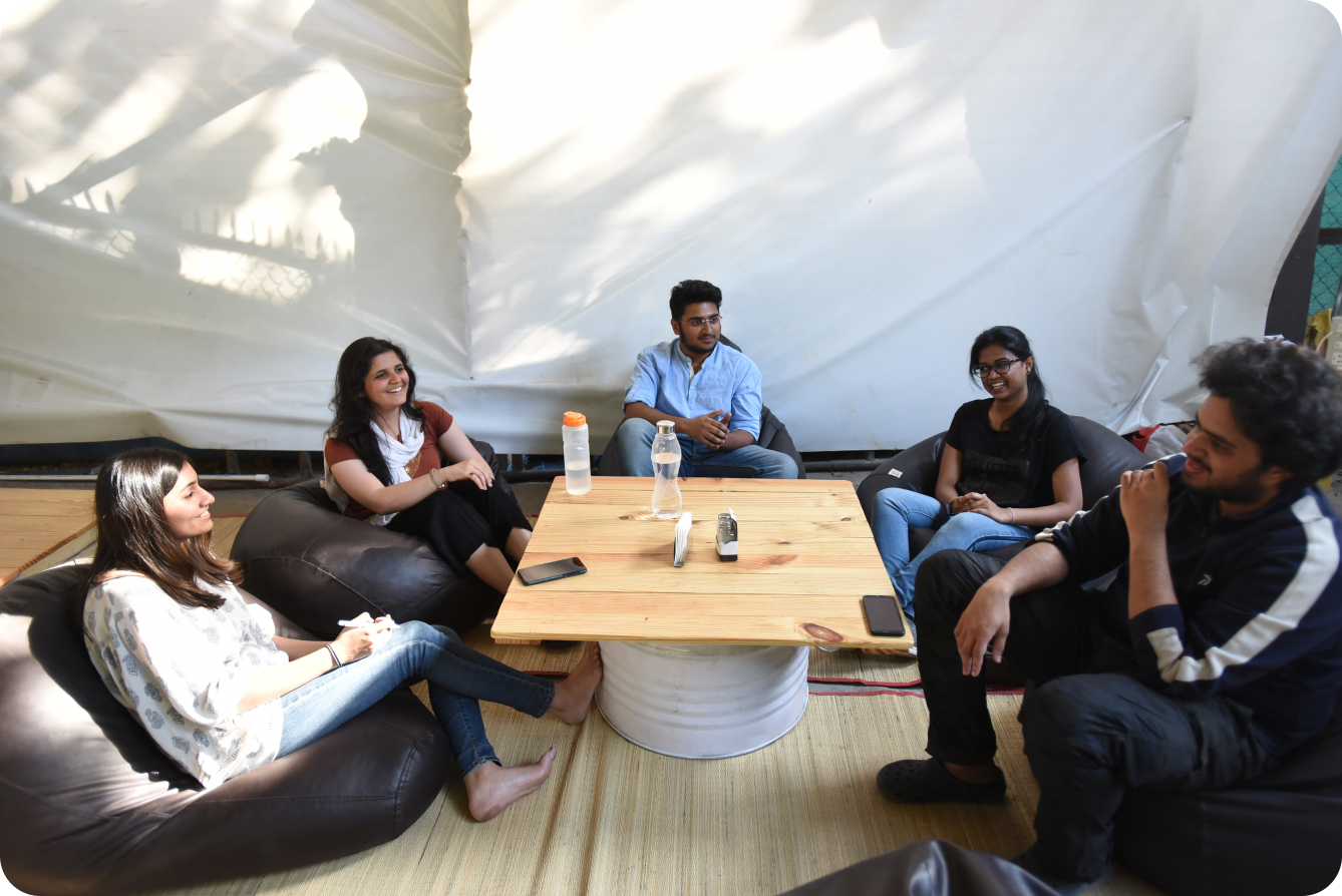 team having discussion in office space