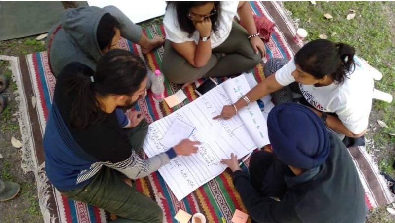 team members discussing and working together