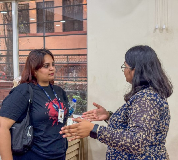 Discussion between two women members