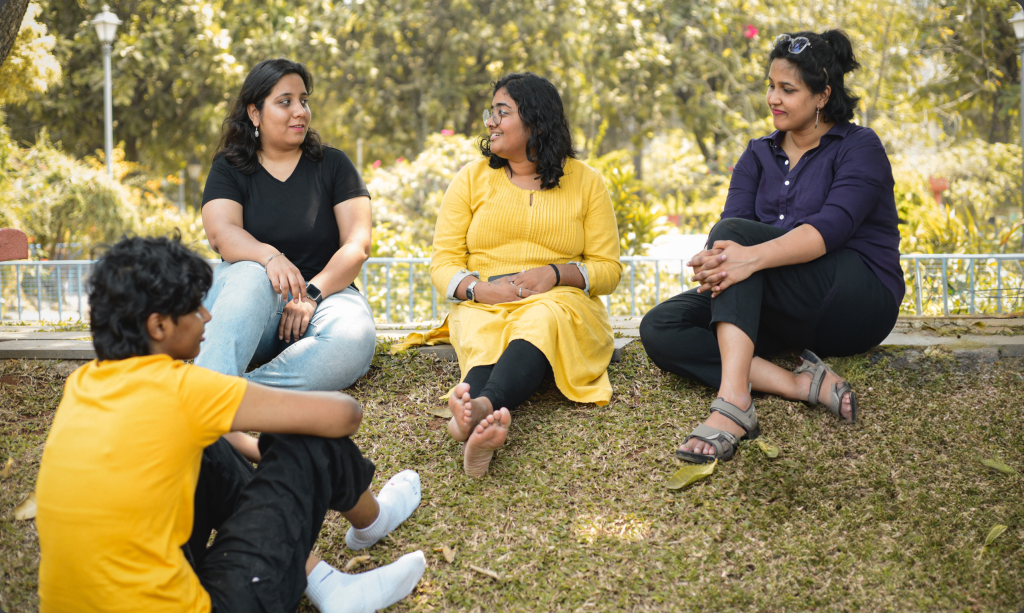 A group of 4 members spending time outdoor2