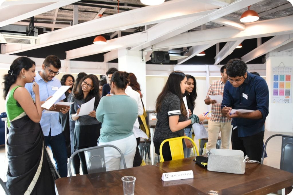 Diverse group of activists collaborating at a workshop, representing One Future Collective’s mission to foster social justice and community-led change